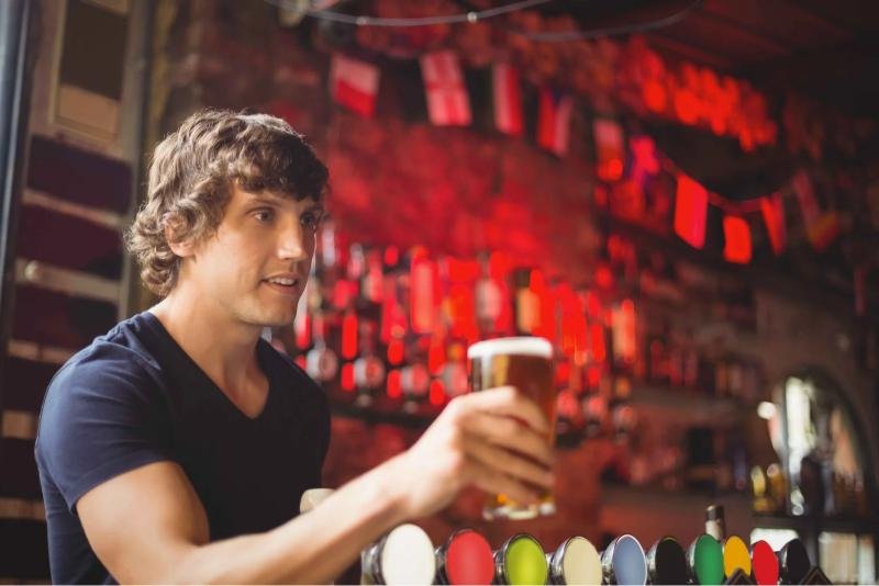 Craft beer being poured at a trendy brewery in Atlanta, showcasing the city’s vibrant craft cocktail and brewing scene.