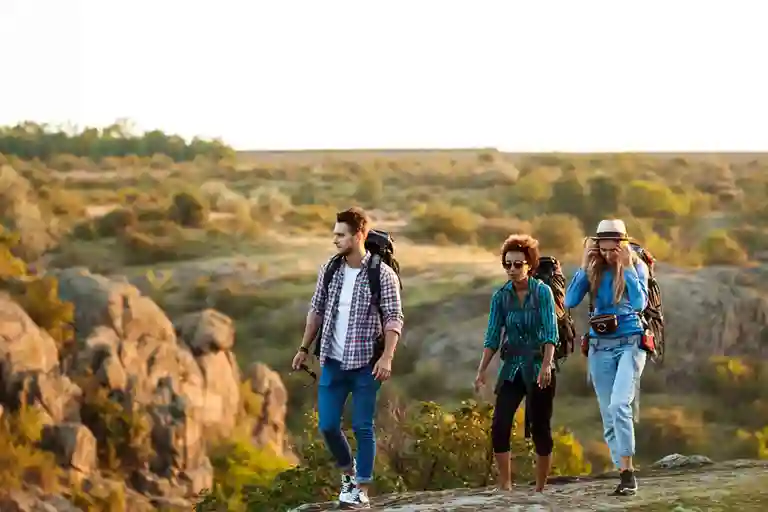 Adventurers hiking and kayaking in the natural landscapes of South Atlanta, showcasing thrilling outdoor activities and local adventure spots.