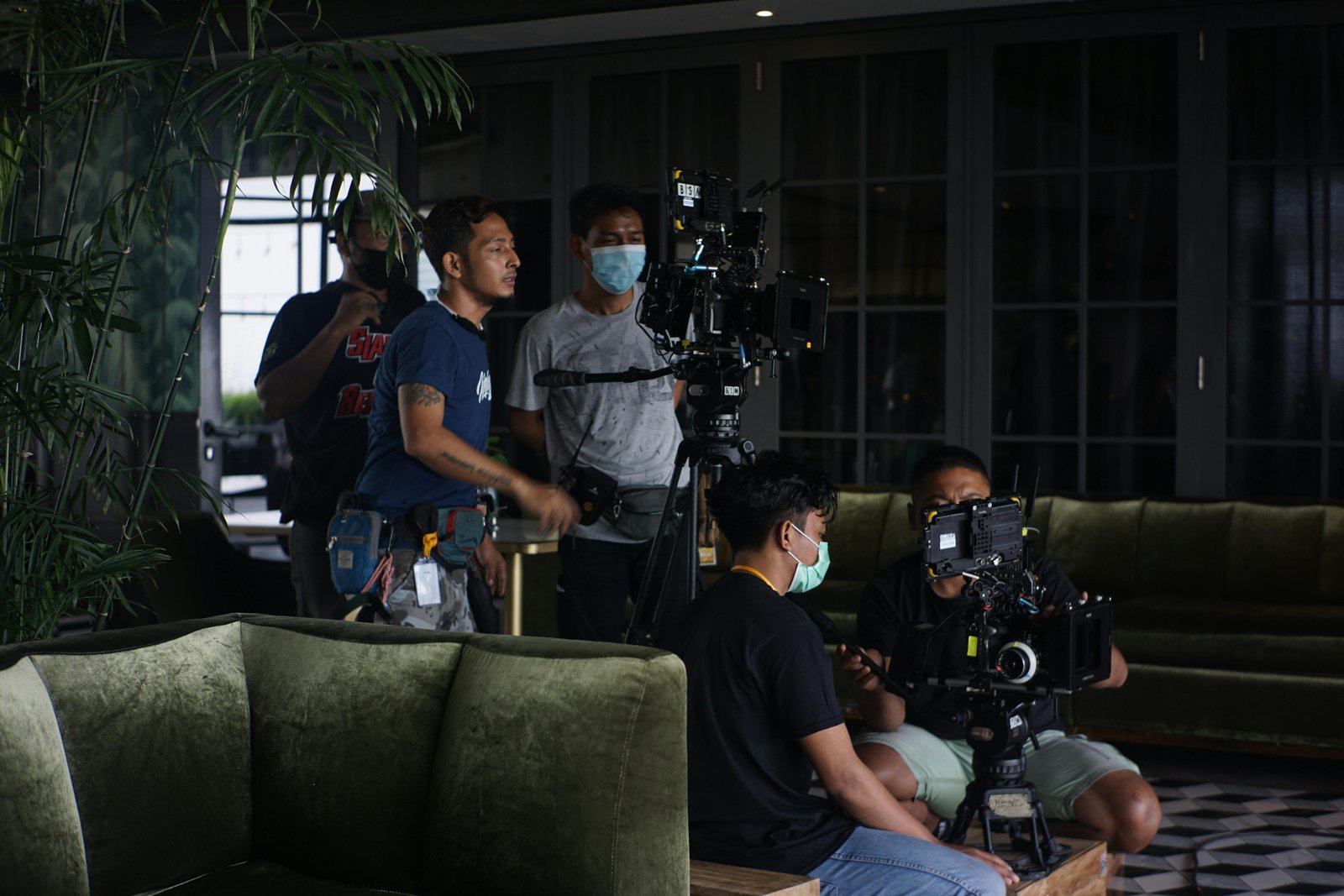 Film crew working on a set in Atlanta with cameras and lighting equipment, highlighting the city's growing film industry and its economic contributions.