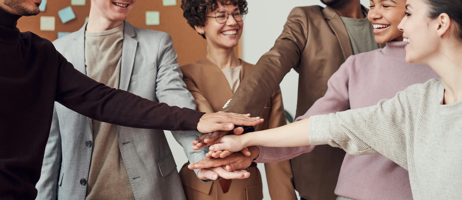 Diverse group of professionals collaborating in a modern Atlanta office, reflecting corporate commitment to diversity and inclusive workplace practices.